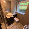 Bathroom-Storage-With-Solid-Minerva-Worktop