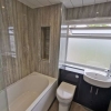 Marbrex-High-Gloss-White-Ceiling-Cladding-With-Single-Silver-Strip
