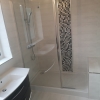 Walk In Shower Area With Vertical Mosaic Strip