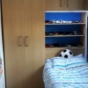 Colour Matched Shelving For Creative Storage