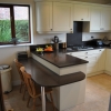 Luxury Kitchen Installation Including MINERVA Solid Worktops & Breakfast Bar Seating Area