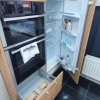 Schuller-Mid-Height-Double-Oven-Housing-Unit-With-Pan-Drawer-Below-And-Integrated-Fridge